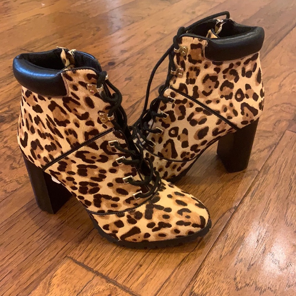 ANTONIO MELANI LACE UP booties. NEVER WORN.